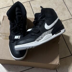 Jordan /Nike Black and White Sneakers